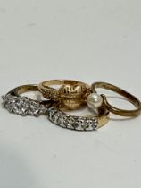 A collection of four various gilt metal paste set rings, L - R. (4)