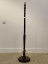 An early to mod 20th century stained and turned ash standard lamp H161cm