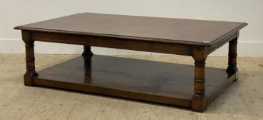 A Quality oak coffee table, possibly by Titchmarsh and Goodwin, the large rectangular top raised