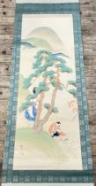 A large Japanese hanging scroll depicting a Heian man and woman foraging mushrooms, signed lower