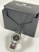 A Tag Heuer Swiss stainless steel Lady's water resistant quartz wrist watch on fitted scale style