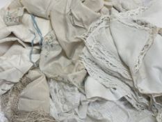 A collection of various linens such as napkins, tablecloths and lacy night gown etc. (a lot)