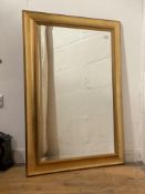 A contemporary gilt framed wall mirror with bevelled plate 103cm x 72cm