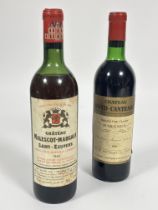 A bottle of Chateau Malescot-Margaux Saint -Exupery 1961 slight loss below neck, and a bottle of