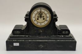 A Victorian black slate mantel clock, the case, of arched form, with floral incised and gilt