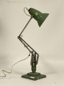 Herbert Terry and Sons Ltd. A mid century vintage Anglepoise lamp, finished in green and (tarnished)