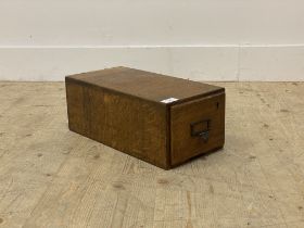 An early 20th century oak single drawer index chest H17cm, W20cm, D42cm
