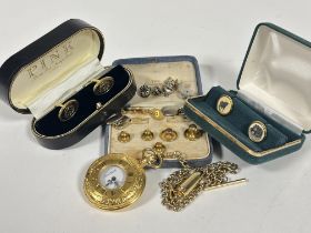 A Jean Pierre gilt metal half Hunter pocket watch with Albert 9mm gilt shell case, a pair of Pink