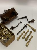 A collection of 26 cast brass carpet clips, together with a pair of bronze curtain tie backs, and