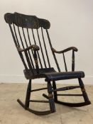 A 19th century American stained walnut 'Lambert Hitchcock' Boston rocking chair, the floral