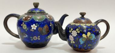 Two late nineteenth century Meiji period Japanese cloisonné miniature/bachelor teapots decorated