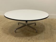 Charles and Ray Eames, an Aluminium group coffee table, the circular white laminate top raised on