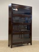A 1930's mahogany four height stacking bookcase by Gunn H147cm, W87cm, D25cm.
