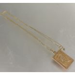 A 9ct gold Scorpio zodiac pendant on 9ct gold trace-link chain, (Total length 24cm) 3.8g