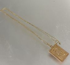 A 9ct gold Scorpio zodiac pendant on 9ct gold trace-link chain, (Total length 24cm) 3.8g