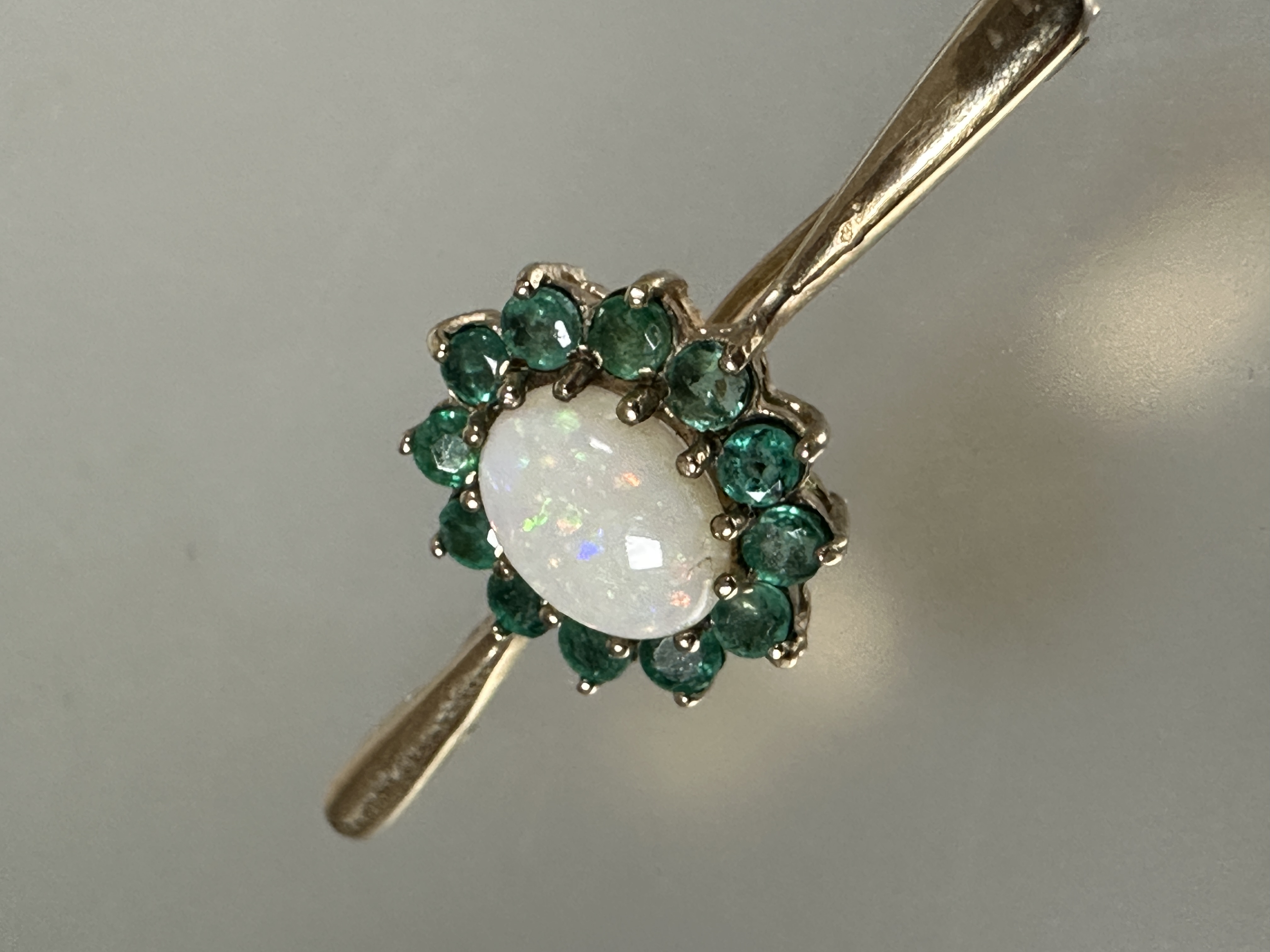 A 9ct gold water opal and emerald cluster set bar brooch, (L x 4cm x W x 1.5cm) 2.6g - Image 2 of 2