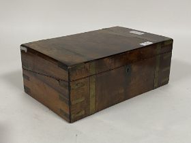 A Victorian brass inlaid walnut writing slope, with embossed gilt leather writing surface to