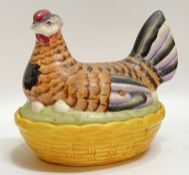 A lidded dish in the form of a roosting hen, possibly Staffordshire