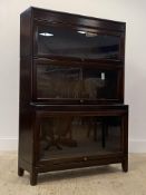 A 1930's mahogany three height stacking bookcase by Gunn H128cm, W87cm, D32cm.