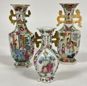 A two late 19thc Chinese Canton miniature octagonal baluster vases decorated with figure in