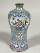 A modern Chinese Peking enamel baluster vase, decorated Bat and Lotus flower collar above two panels