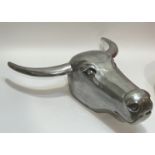 A large wall mounted cast aluminium bull's head (h- 54cm, w- 52cm)