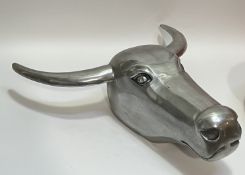 A large wall mounted cast aluminium bull's head (h- 54cm, w- 52cm)