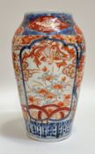 A Japanese Imari porcelain vase with panel decoration of exotic birds/Ho-ho and flowers
