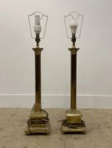 A large pair of cast brass Corinthian column form table lamps. H67cm