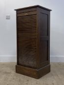An early 20th century tambour fronted filling cabinet with fitted interior H107cm, W48cm, D42cm.