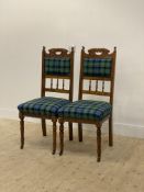 A pair of late Victorian walnut side chairs, the back rest and seat upholstered in tartan fabric
