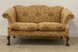 A quality George III style camel back sofa, the frame and squab cushions upholstered in cotton