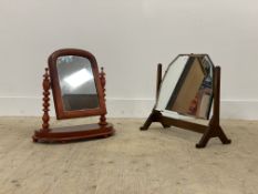 An early 20thc century frameless vanity swing mirror with bevelled plate on a mahogany stand (H47cm)