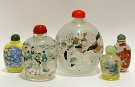 A group of Chinese snuff bottles comprising two large inside-painted snuff bottles variously decorat