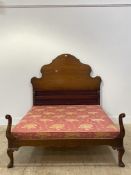An early 20th century mahogany bed frame complete with irons and box base. H148cm, W145cm, L199cm