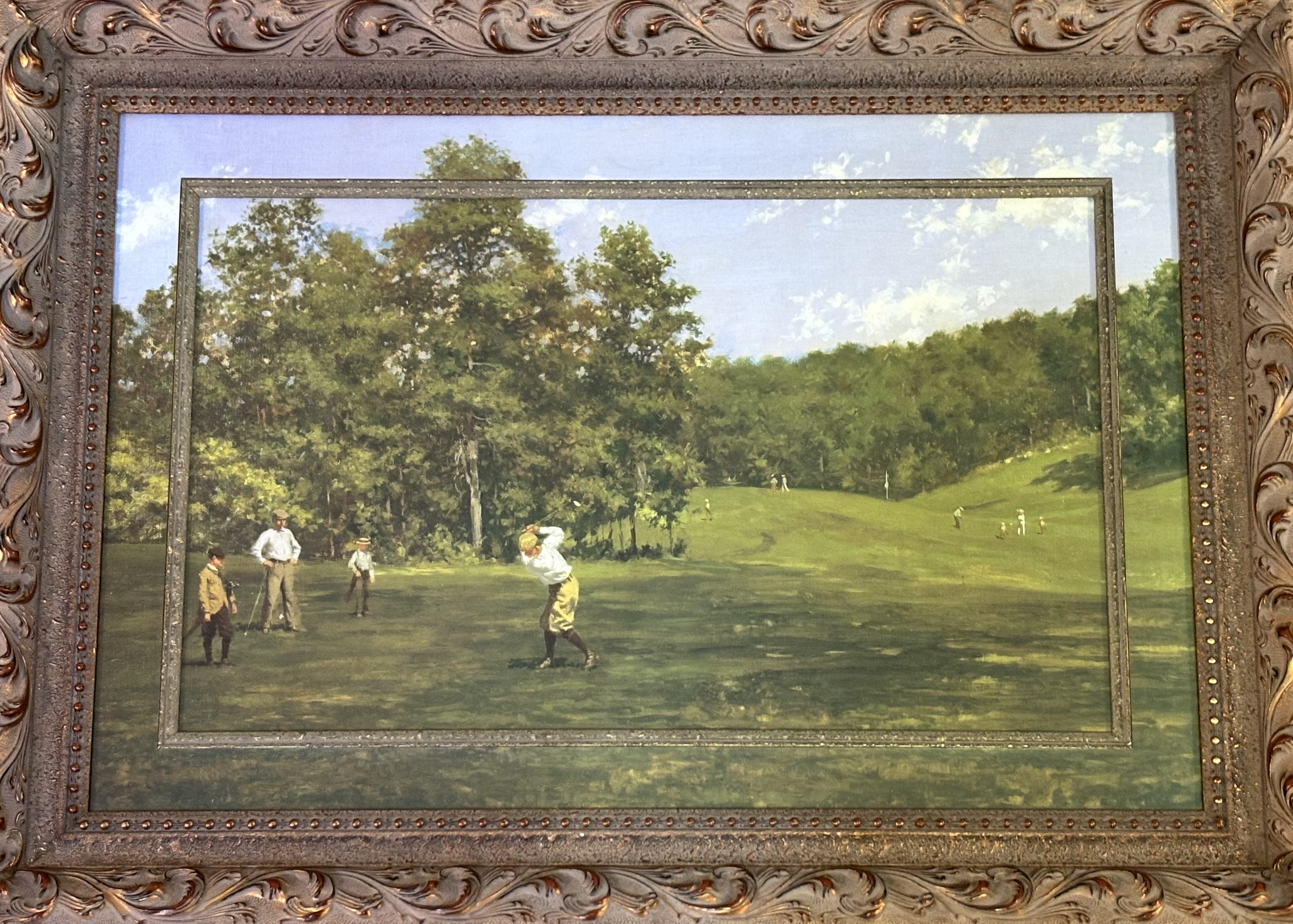 Unknown artist, summer golf course scene print, in a glazed composition frame. (50cmx75cm)