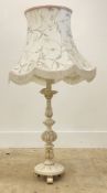 A white painted carved treen table lamp formed as an 18th century style Spanish candle stick,