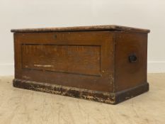 A Victorian scumbled pine kist, the hinged top opening to an interior fitted with a candle box and