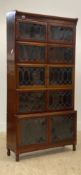 Minty, an early 20th century mahogany five height sectional bookcase with leaded glass doors,