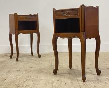 A pair of French cherry wood bedside tables, each with a shaped galleried top above drawer and
