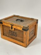 A Vintage 1920's- 40's pine and plywood Eggs box with hinged top and original wrought iron handle