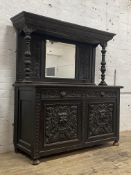 A Victorian stained oak mirror back sideboard, the projecting cornice over cushioned and arcaded