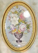 A large pictorial needlepoint of a classical urn with flowers in gilt oval frame (h- 86.5cm, w- 61.5