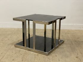 A Vintage Chromed metal and smoked glass two tier coffee lamp table. H51cm, 65cm x 65cm.