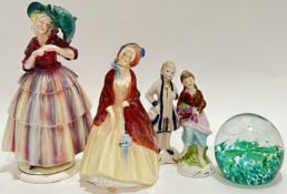 A mixed group of ceramic figures comprising a Royal Doulton 'Paisley Shawl' figure of a lady (marked