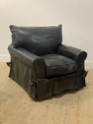 A contemporary black leather upholstered armchair H90cm