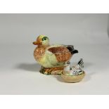 An Italian nesting ceramic duck tureen with spoon (w-18cm h-15cm) and a small ceramic nesting hen (