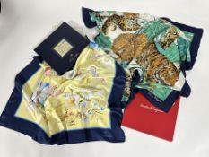 A Salvatore Ferragamo silk scarf with Lion, Lioness and two cubs design, complete with original card