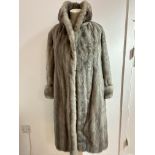 A 1960's- 70's Lady's full length gray Mink full length coat with folded collar, bracelet sleeves