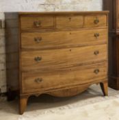 A Regency period and later mahogany bow front chest, fitted with three short and three long
